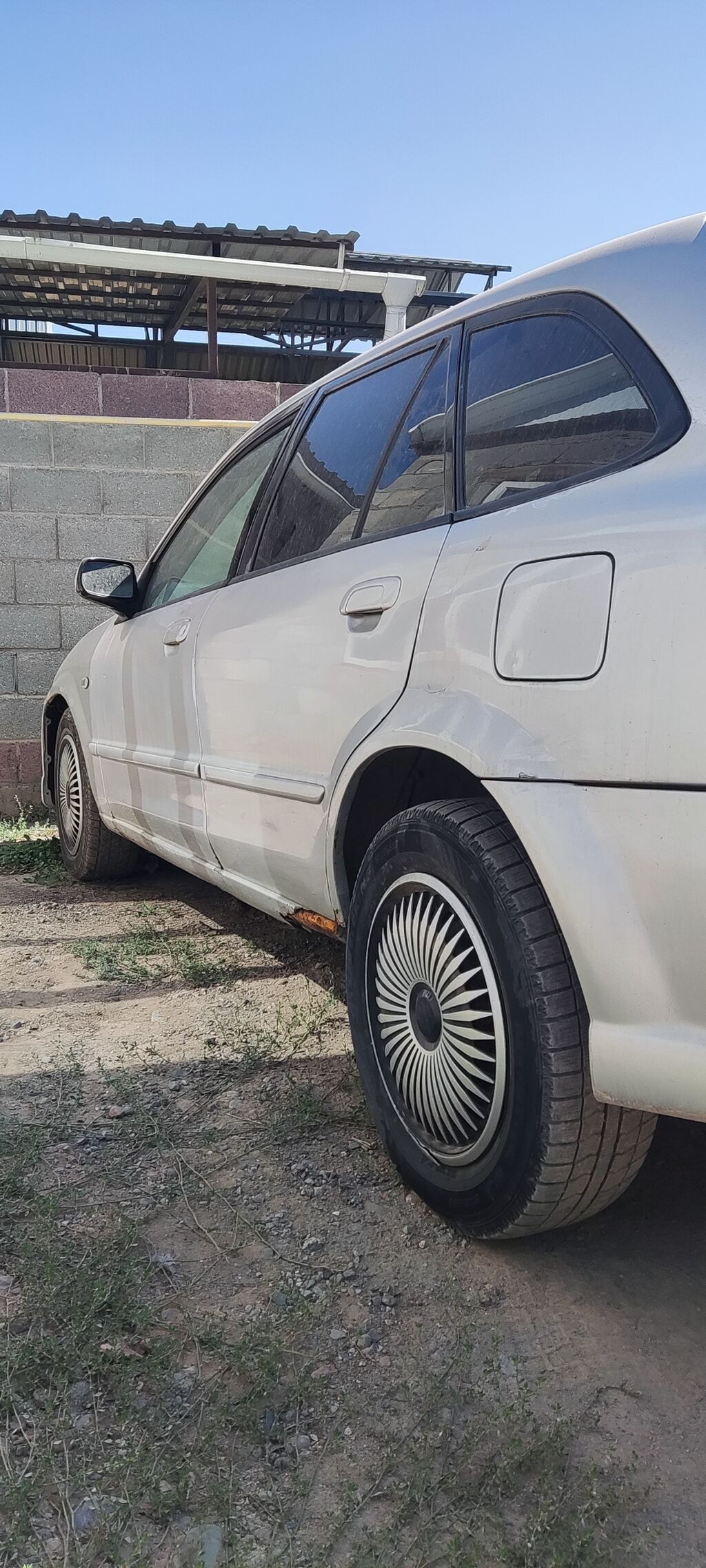 Mazda Familia: 2003 г., 2 л, Механика, Бензин, Универсал: фото 1