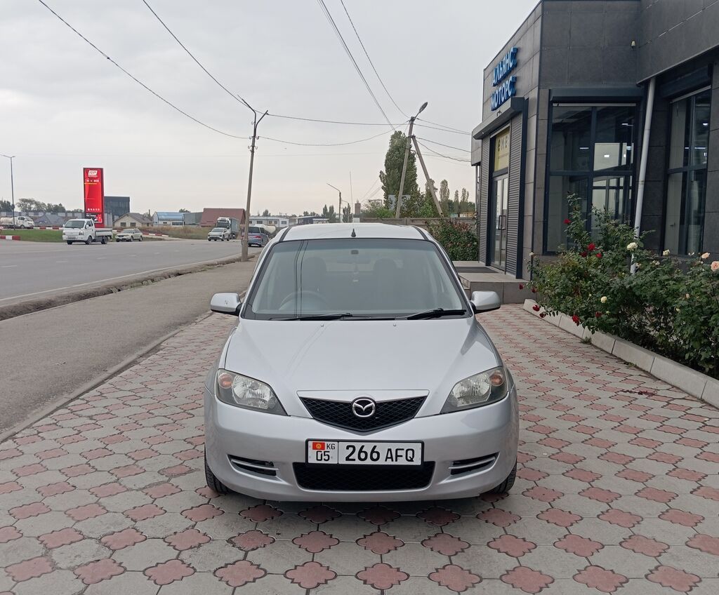 Mazda Demio: 2004 г., 1.5 л, Автомат, Бензин, Хэтчбэк: фото 2