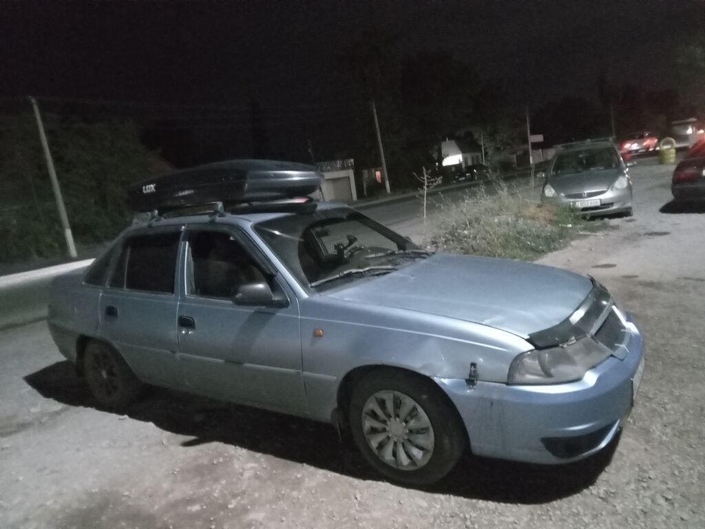 Daewoo Nexia: 2011 г., 1.5 л, Механика, Седан: фото 5