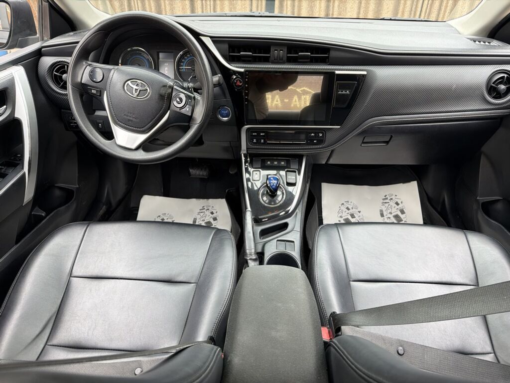 Toyota Corolla: 2019 г., 1.8 л, Автомат, Гибрид, Седан: фото 6