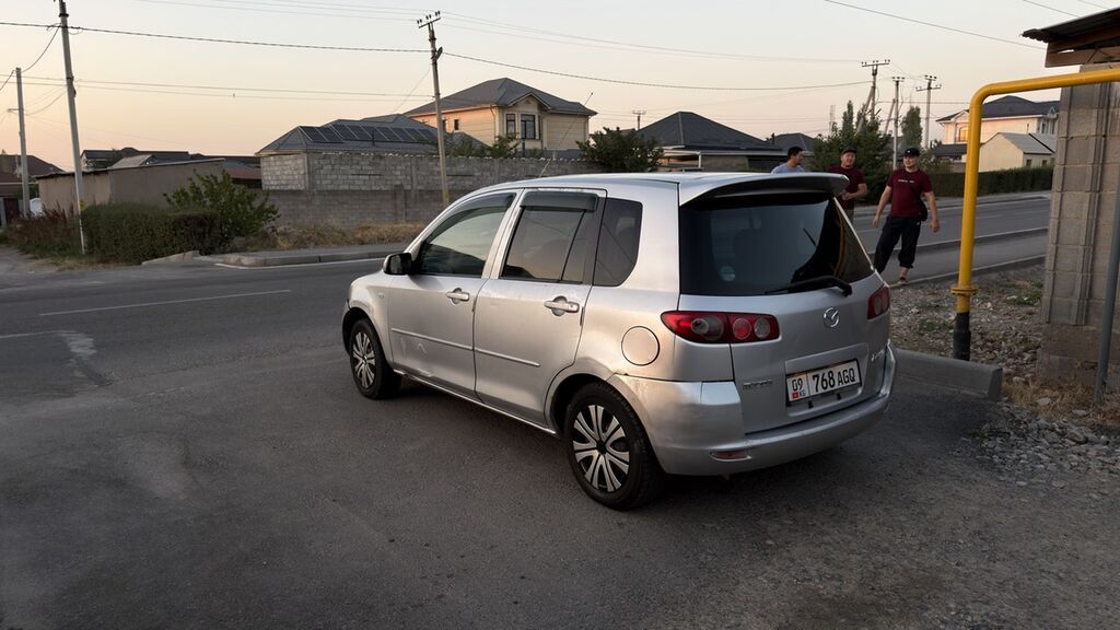 Mazda Demio: 2004 г., 1.3 л, Автомат, Бензин, Хэтчбэк: фото 6