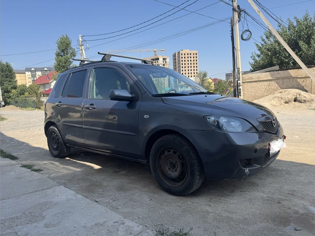 Mazda Demio: 2003 г., 1.3 л, Механика, Бензин, Хэтчбэк: фото 3