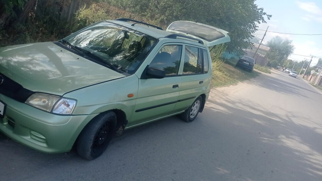 Mazda Demio: 2003 г., 1.3 л, Механика, Бензин, Хэтчбэк: фото 4