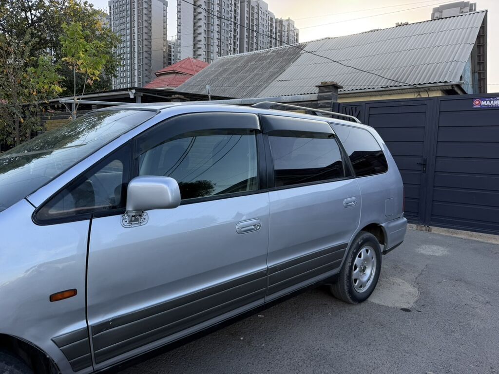 Honda Odyssey: 1998 г., 2.3 л, Автомат, Газ, Минивэн: фото 3