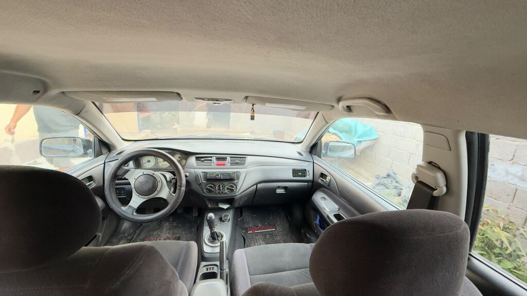 Mitsubishi Lancer: 2003 г., 2 л, Механика, Бензин, Универсал: фото 8
