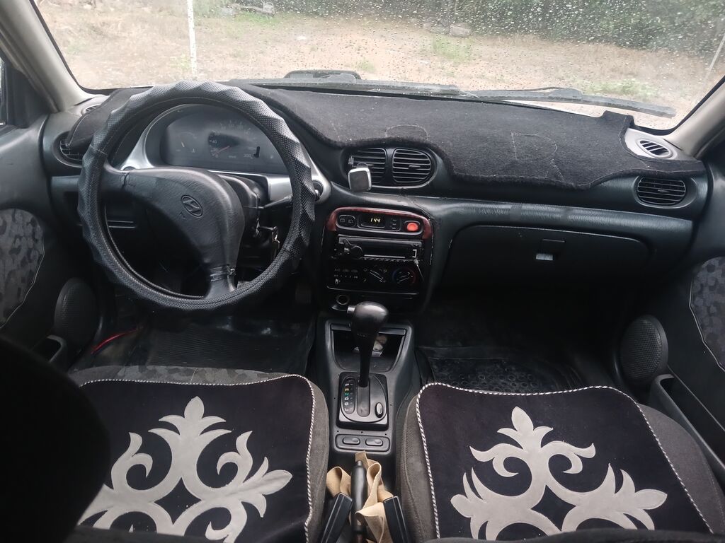 Daewoo Nexia: 1996 г., 1.5 л, Механика, Бензин, Седан: фото 7