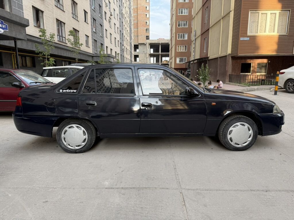 Daewoo Nexia: 2011 г., 1.5 л, Механика, Бензин, Седан: фото 2