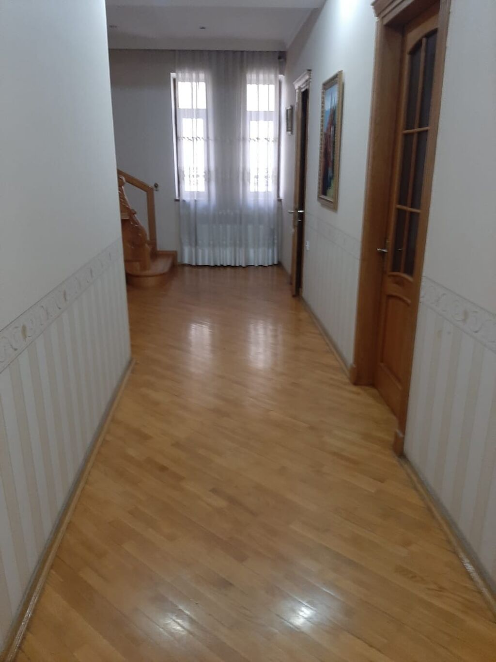 T. Əliyev küçəsində. Mülkiyyətdə 650m² olan. 7 sotda 4mərtəbəli 8