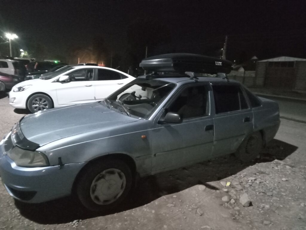 Daewoo Nexia: 2011 г., 1.5 л, Механика, Седан: фото 2