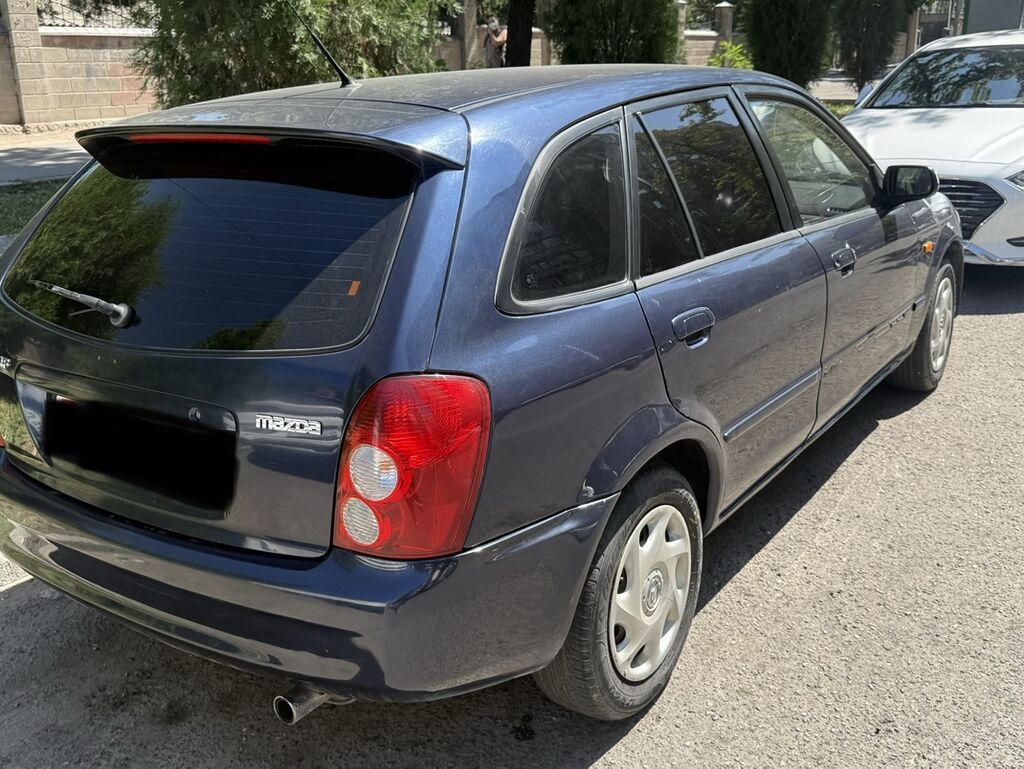 Mazda 323: 2002 г., 1.6 л, Механика, Бензин, Хэтчбэк: фото 5