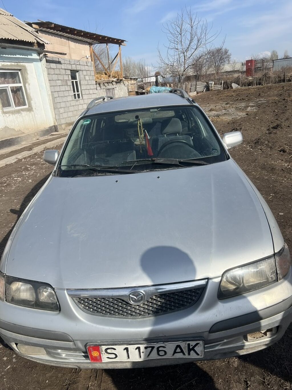 Mazda Familia: 1999 г., Механика, Бензин, Универсал