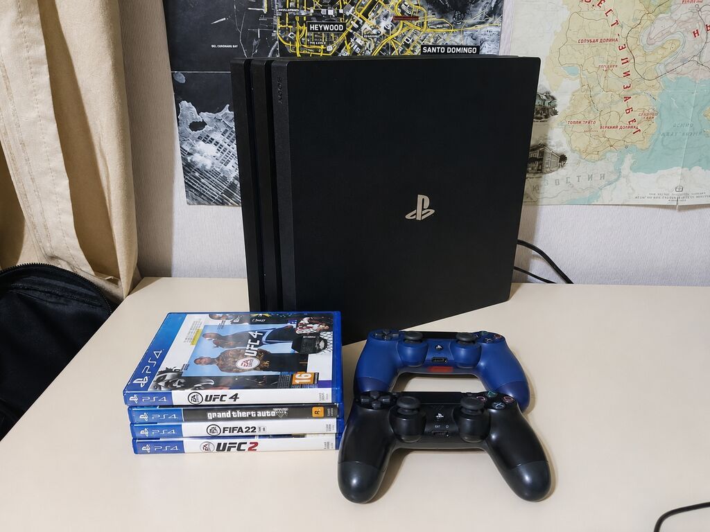 PlayStation 4 Pro + 2 DualShock 4 + 4 диска: UFC 4, GTA V, FIFA 22