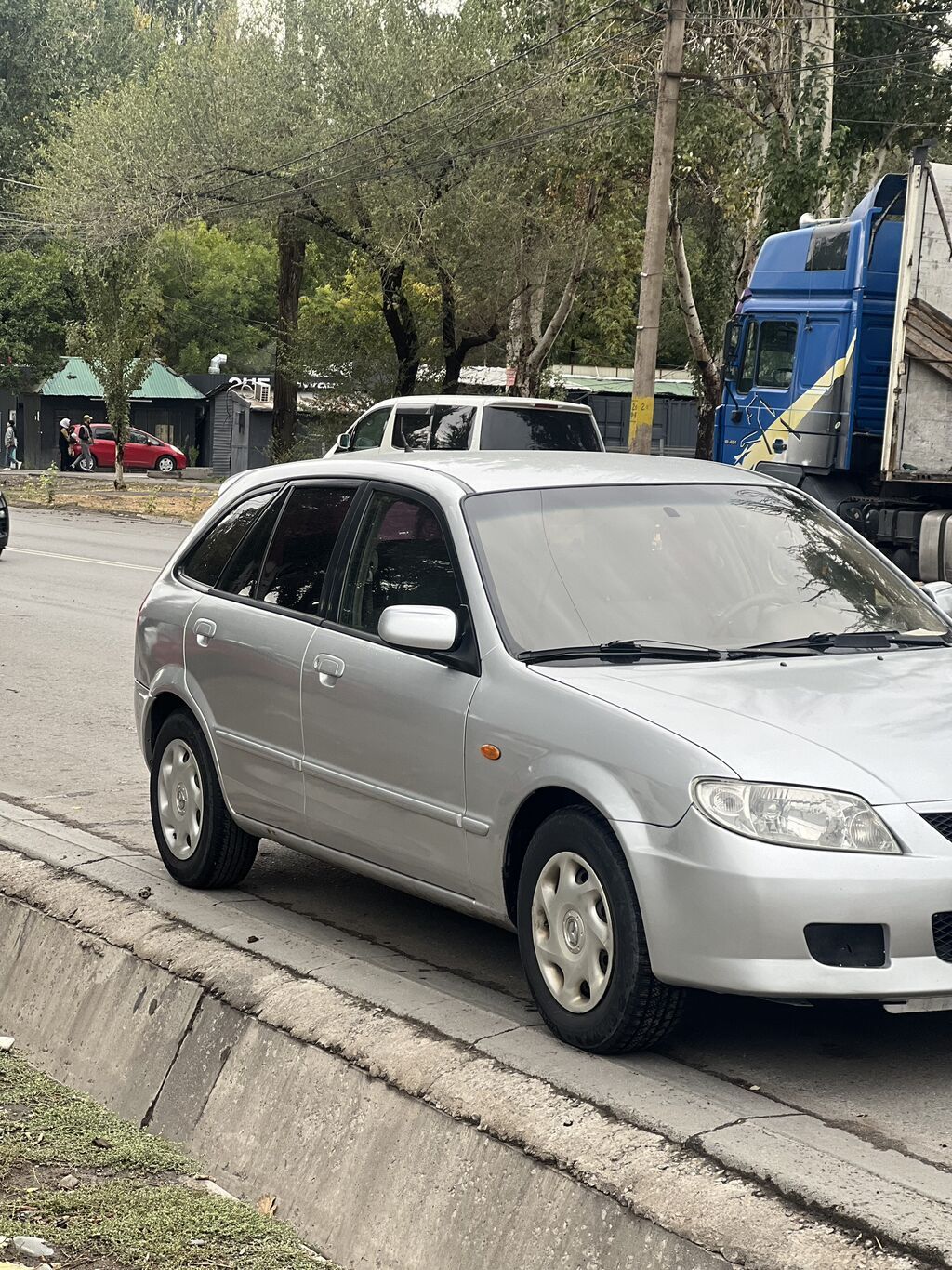 Mazda Familia: 2002 г., 1.6 л, Автомат, Бензин, Универсал: фото 5