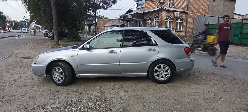 Subaru Impreza: 2004 г., 1.5 л, Автомат, Бензин, Универсал: фото 3