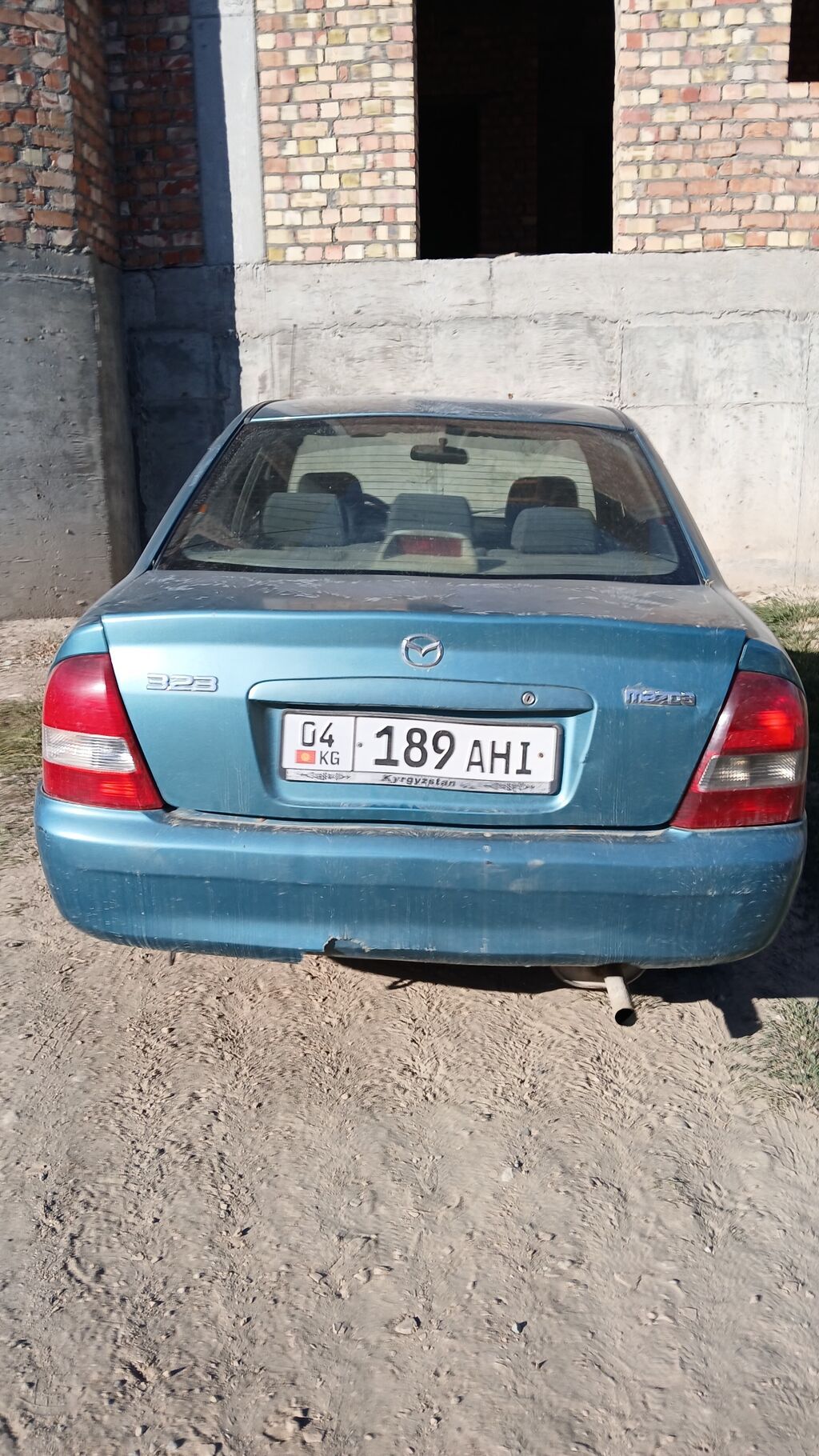 Mazda 323: 2002 г., 1.6 л, Механика, Газ, Седан: фото 3