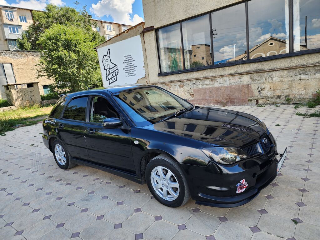 Subaru Impreza: 2005 г., 2 л, Автомат, Бензин, Универсал — фото 4
