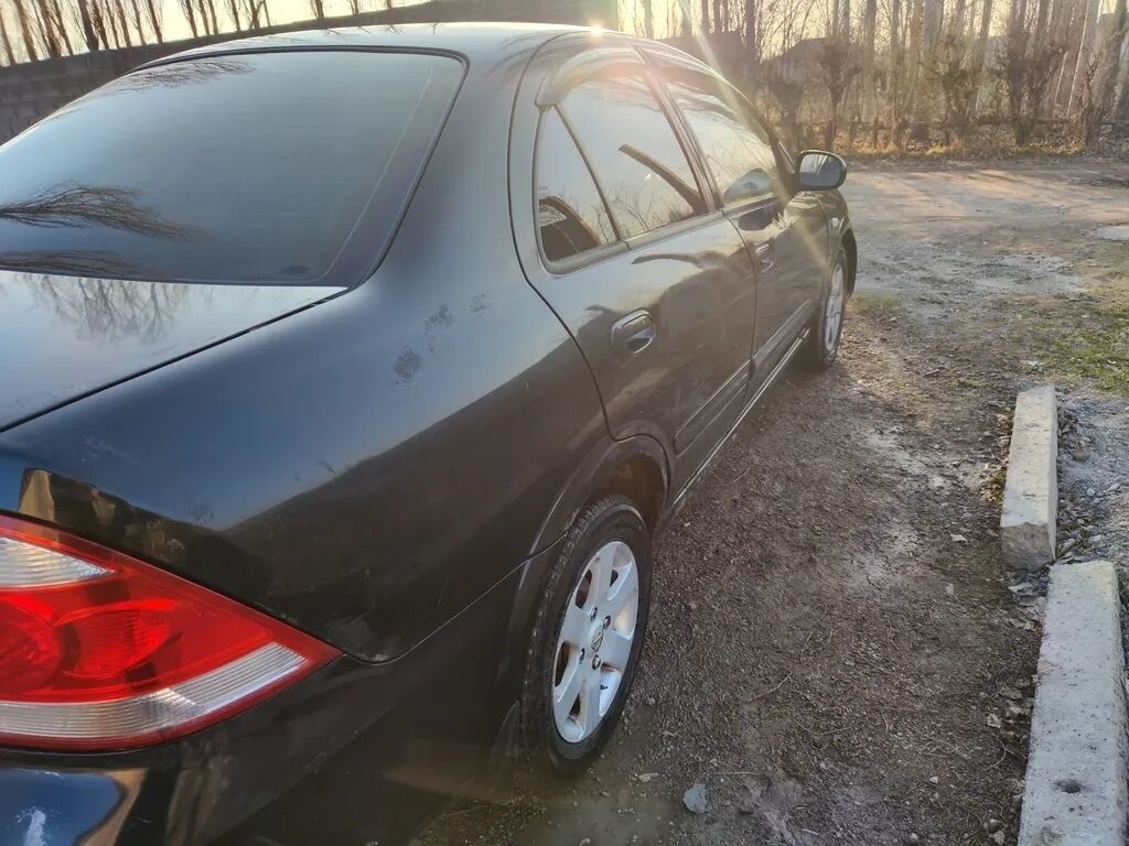 Nissan Almera Classic: 2009 г., 1.8 л, Автомат, Бензин: фото 4
