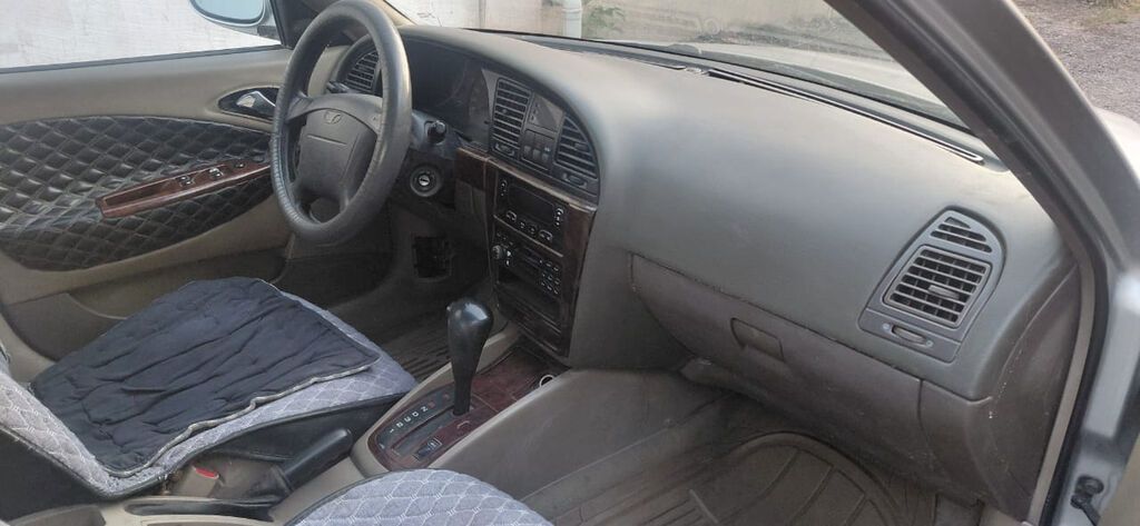 Daewoo Nubira: 2001 г., 1.5 л, Автомат, Бензин, Седан: фото 7