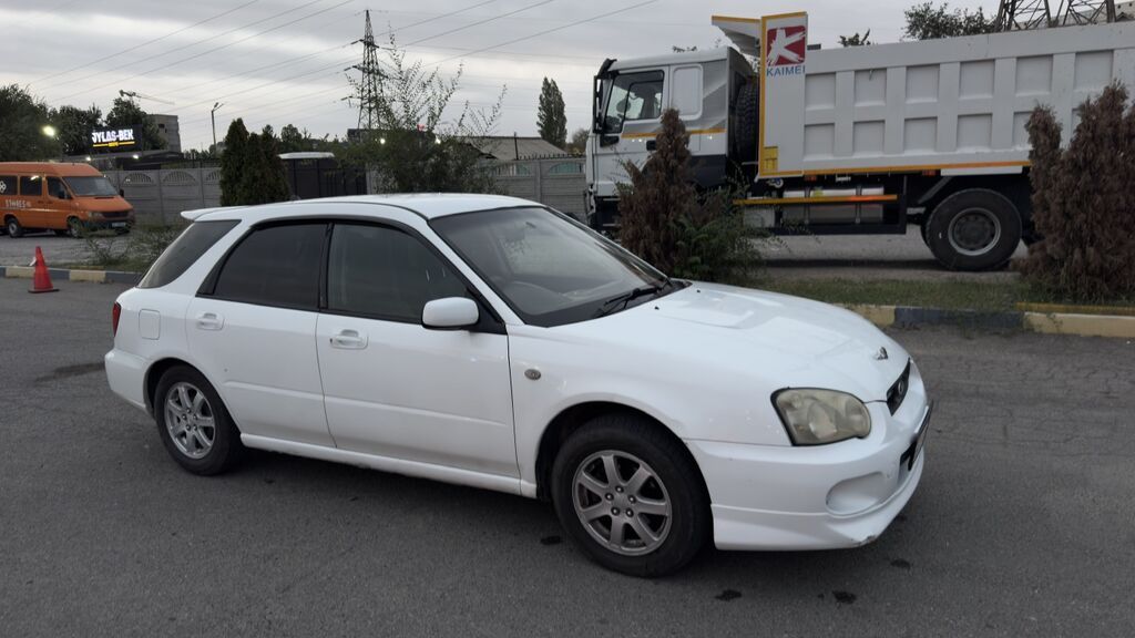 Subaru Impreza: 2004 г., 1.5 л, Автомат, Бензин, Универсал: фото 2