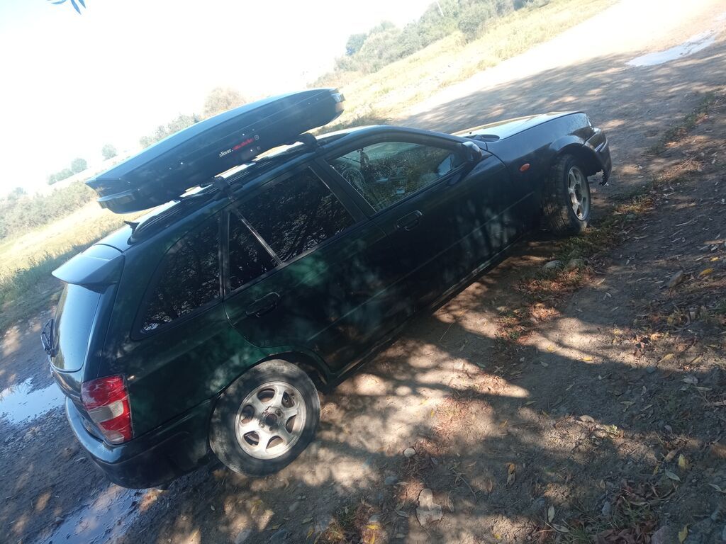 Mazda Familia: 1999 г., 1.6 л, Механика, Бензин, Универсал: фото 4