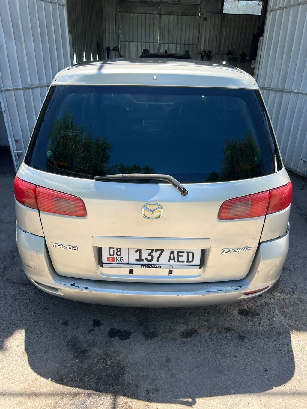Mazda Demio: 2004 г., 1.3 л, Автомат, Бензин, Хэтчбэк — фото 4