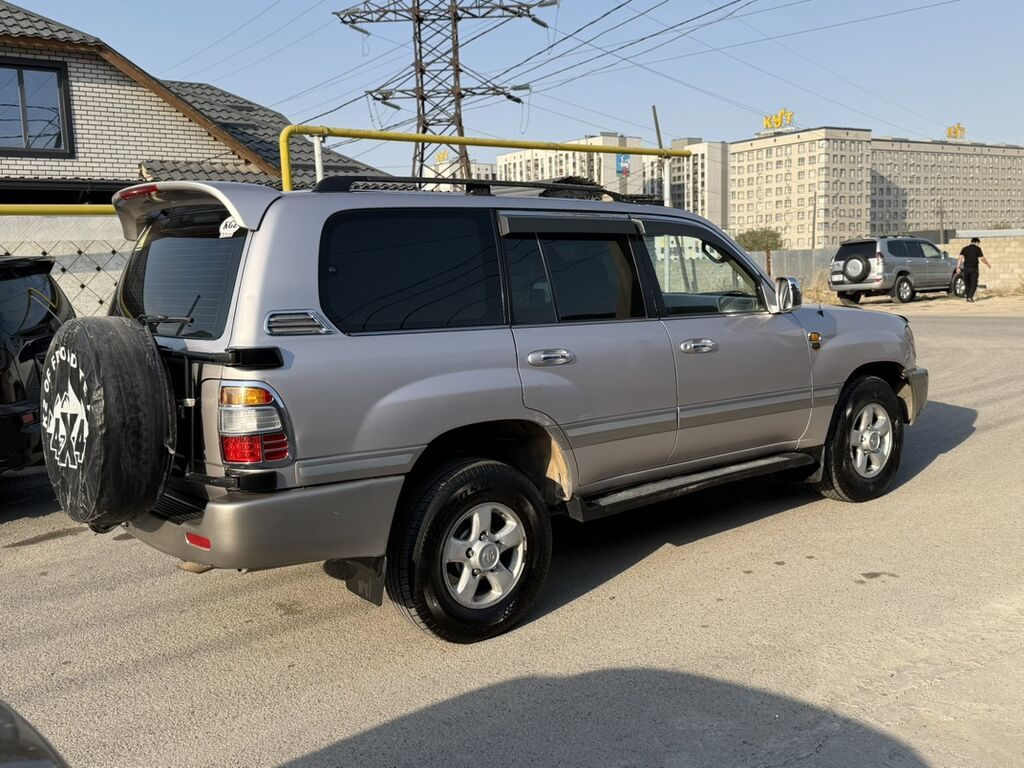 Toyota Land Cruiser: 2001 г., 4.7 л, Автомат, Газ, Внедорожник: фото 3