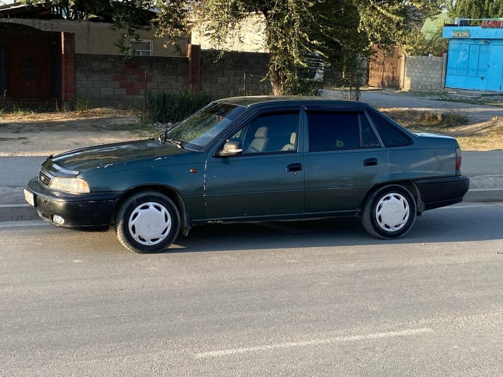 Daewoo Nexia: 2002 г., 1.5 л, Механика, Седан: фото 4
