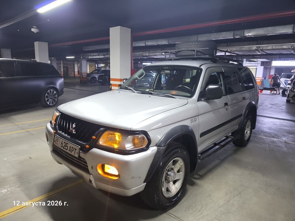 Mitsubishi Pajero Sport: 2003 г., 3 л, Автомат, Газ, Внедорожник: фото 5