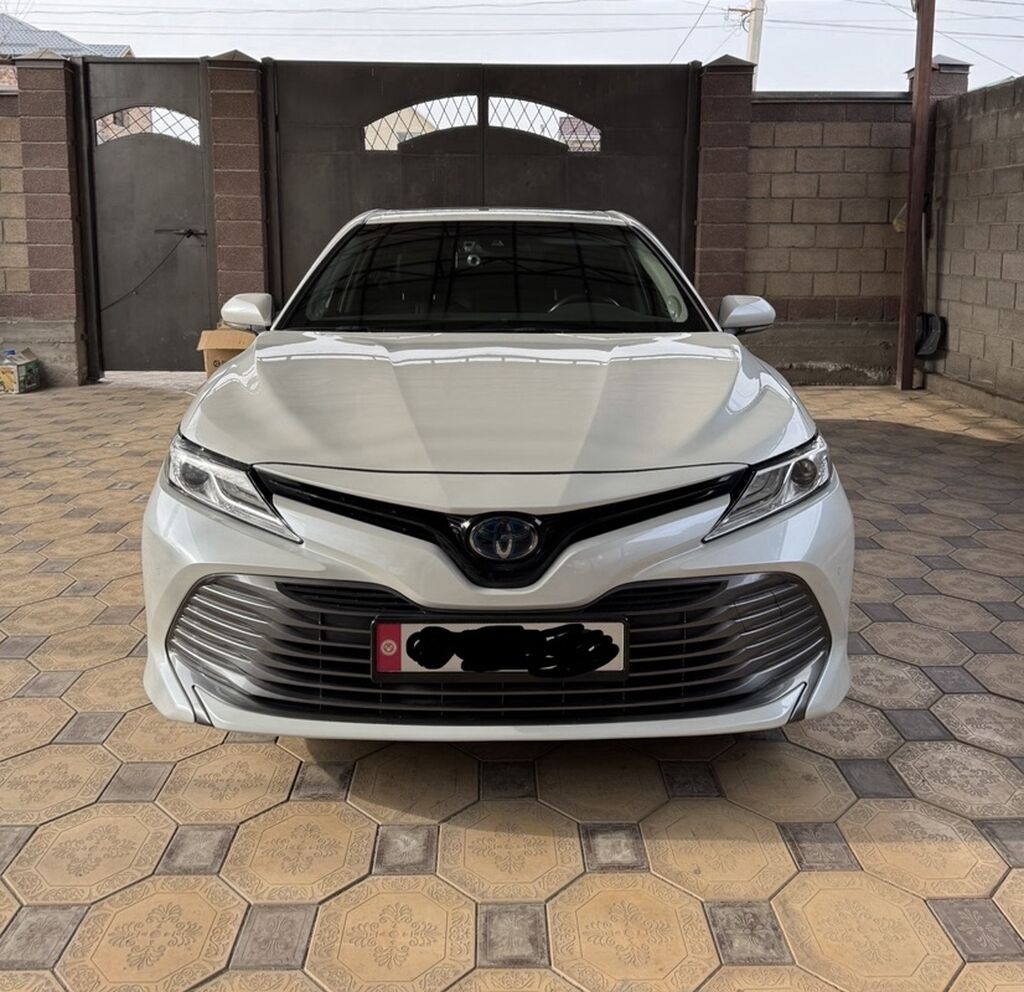 Toyota Camry: 2019 г., Гибрид, Седан: фото 1