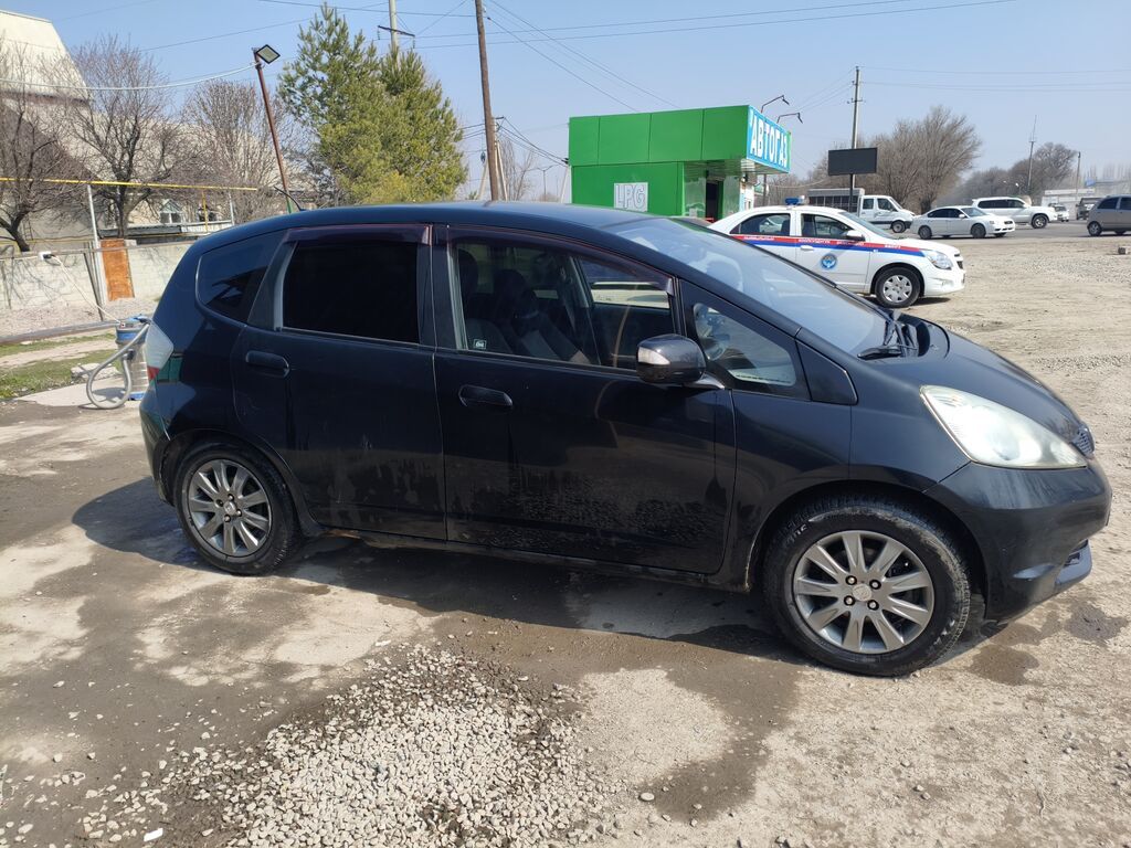 Honda Jazz: 2009 г., 1.4 л, Робот, Бензин, Фастбек: фото 4