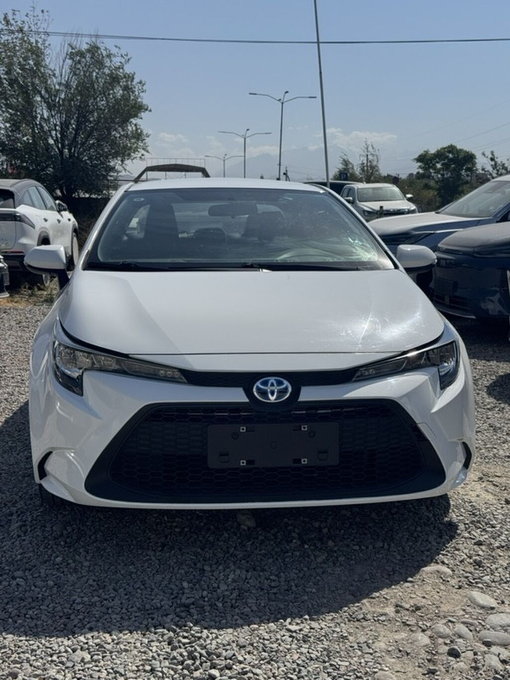 Toyota Corolla: 2023 г., 1.8 л, Вариатор, Гибрид, Седан: фото 2