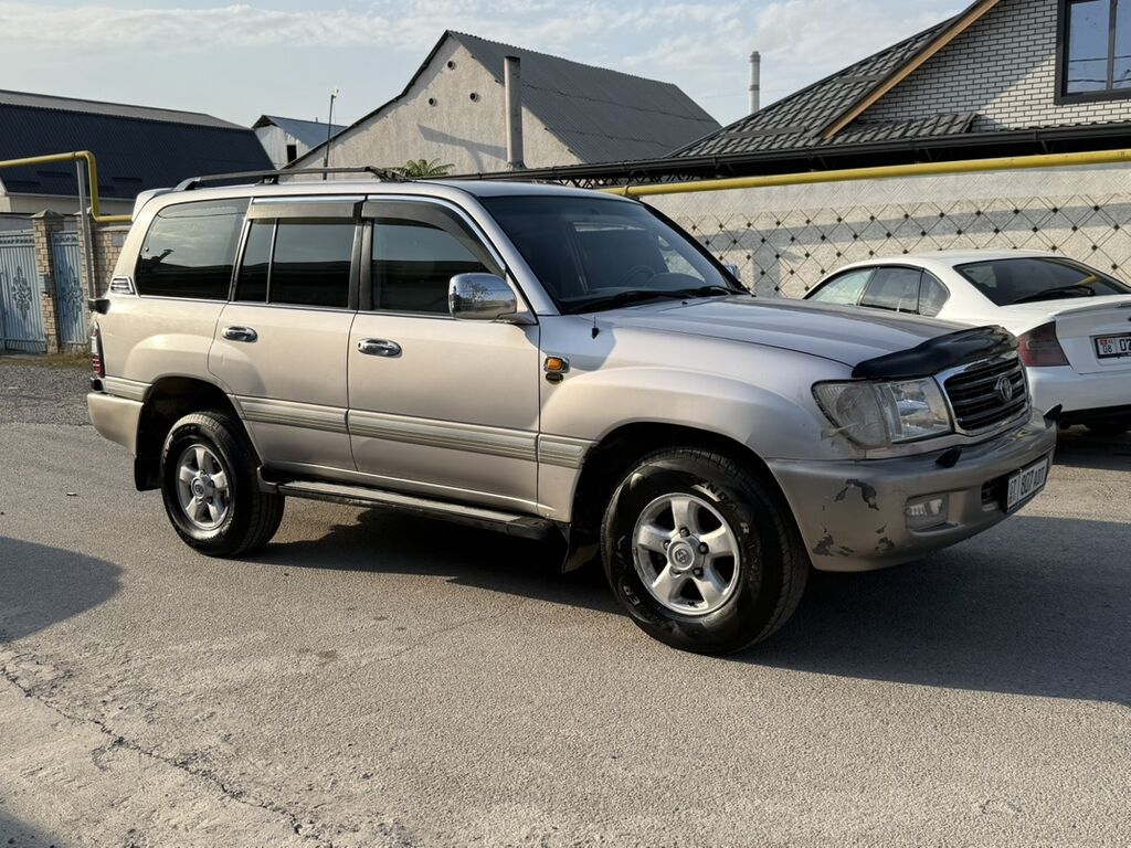 Toyota Land Cruiser: 2001 г., 4.7 л, Автомат, Газ, Внедорожник: фото 6