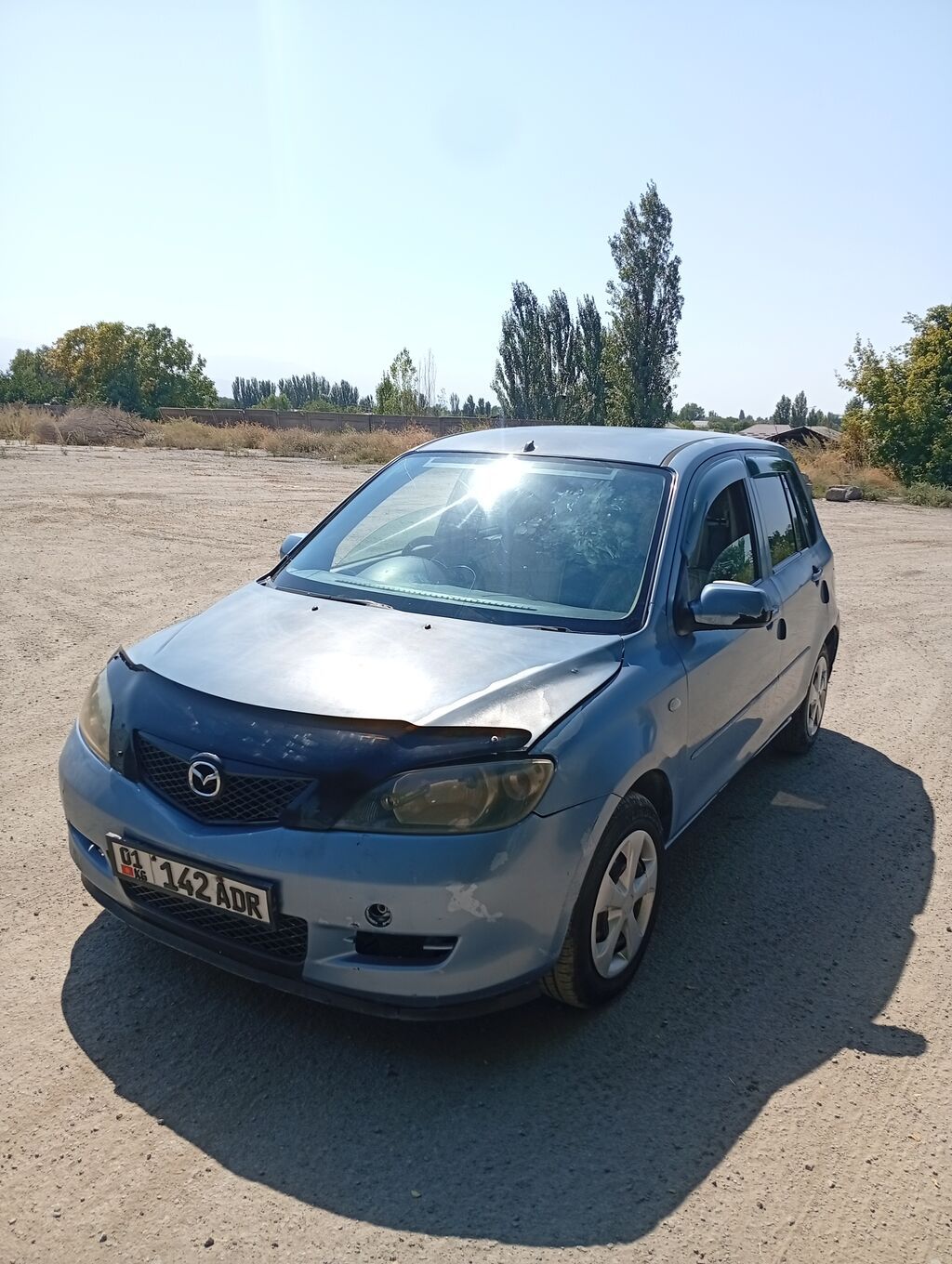 Mazda Demio: 2004 г., 1.3 л, Автомат, Хэтчбэк: фото 2