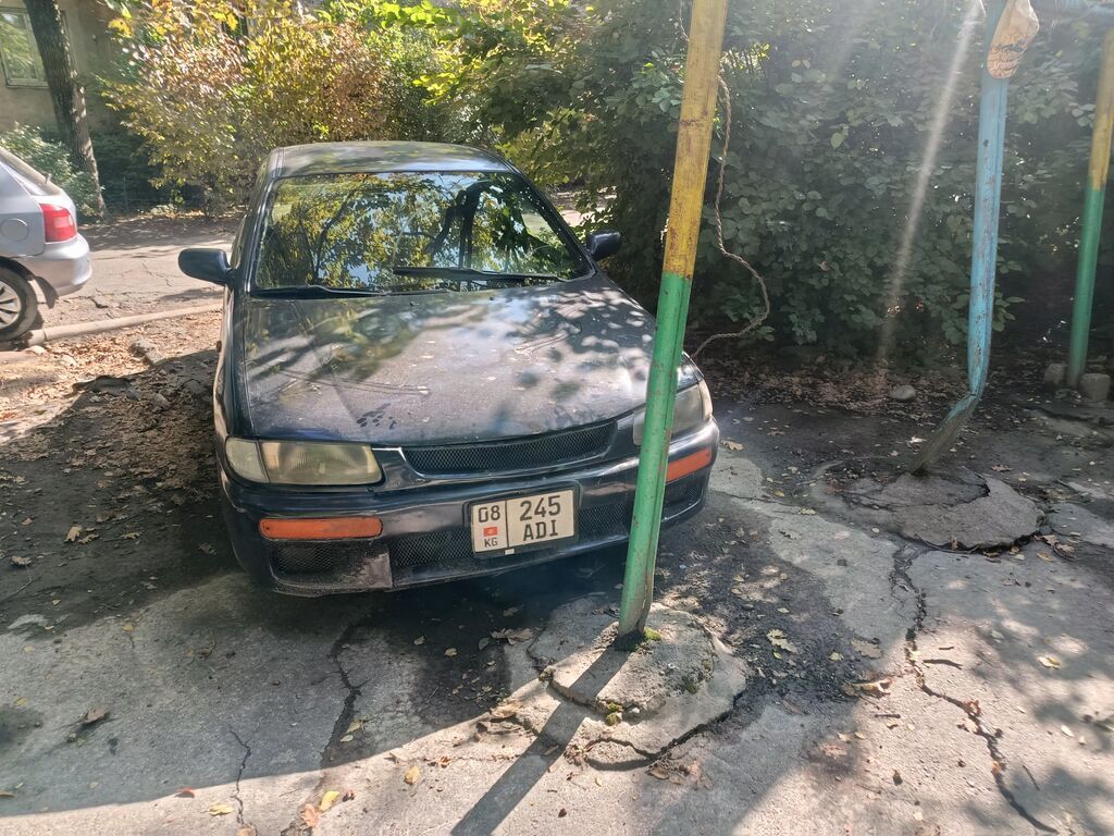 Mazda 323, седан, приблизительно конец 1990‑х – начало 2000‑х годов: фото 7