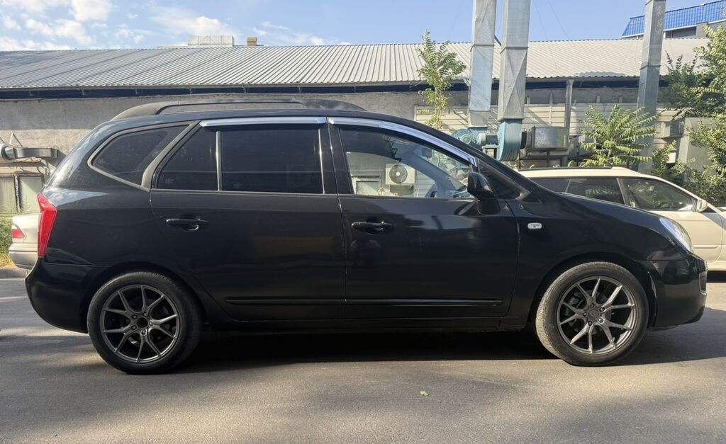 Kia Carens: 2008 г., 2 л, Автомат, Газ, Минивэн: фото 4