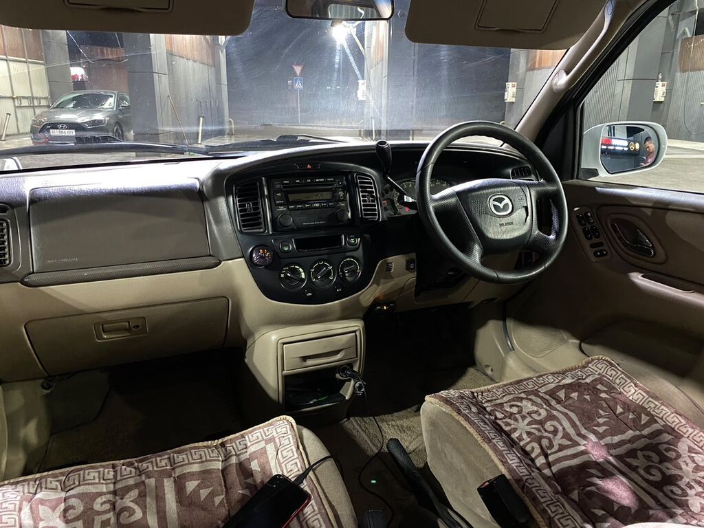 Mazda Tribute: 2001 г., 2 л, Автомат, Газ, Кроссовер: фото 2