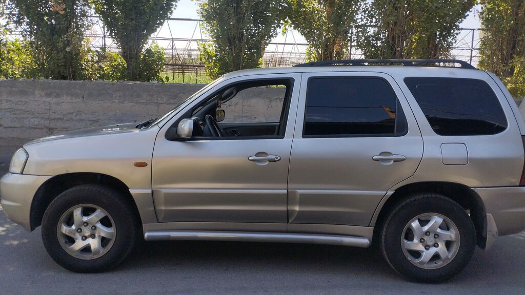 Mazda Tribute: 2002 г., 2 л, Механика, Бензин, Кроссовер: фото 2