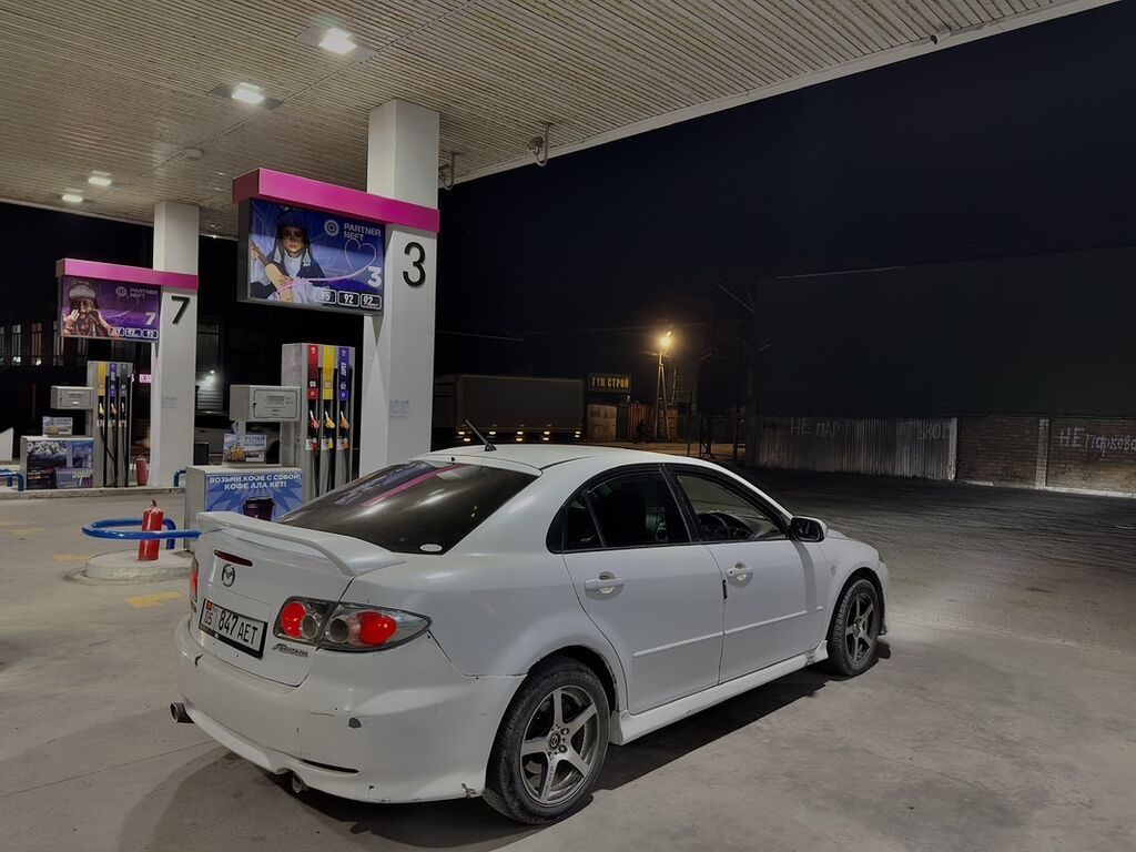 Mazda Atenza: 2002 г., 2.3 л, Автомат, Газ, Седан: фото 1