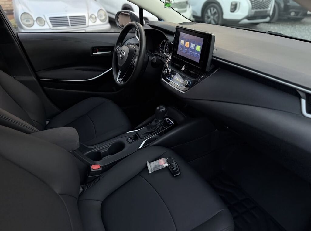 Toyota Corolla: 2022 г., 1.8 л, Автомат, Гибрид, Седан: фото 7