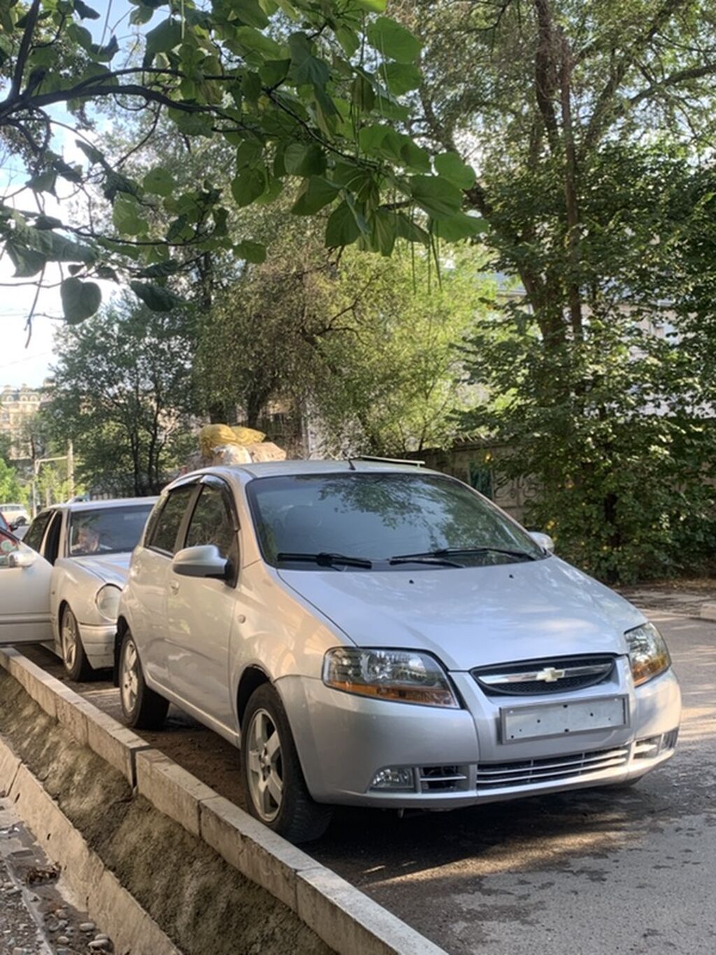 Chevrolet Aveo: 2006 г., 1.4 л, Механика, Бензин, Хэтчбэк — фото 2
