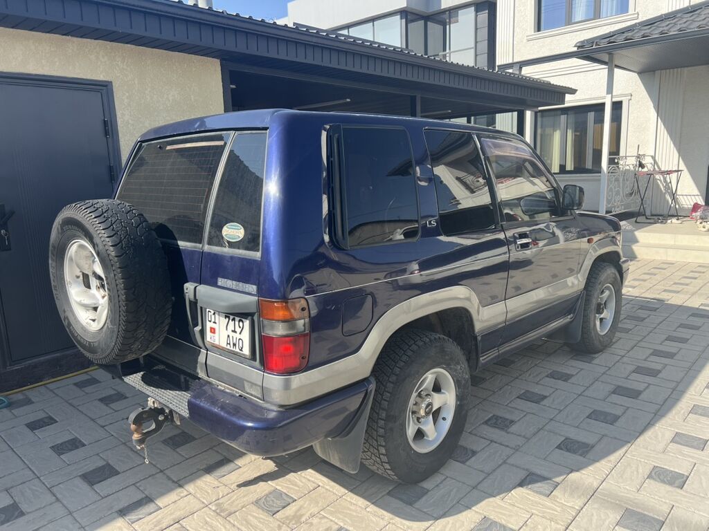 Isuzu Trooper: 1995 г., 3.1 л, Автомат, Дизель, Внедорожник: фото 4