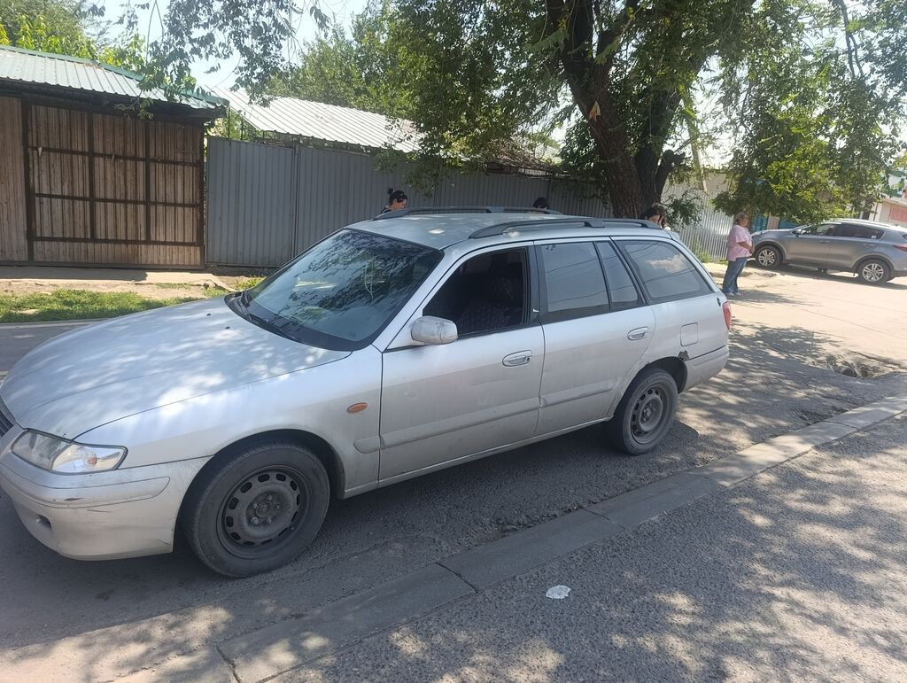 Mazda Capella 2001 г., универсал, 2.0 л, механика: фото 8