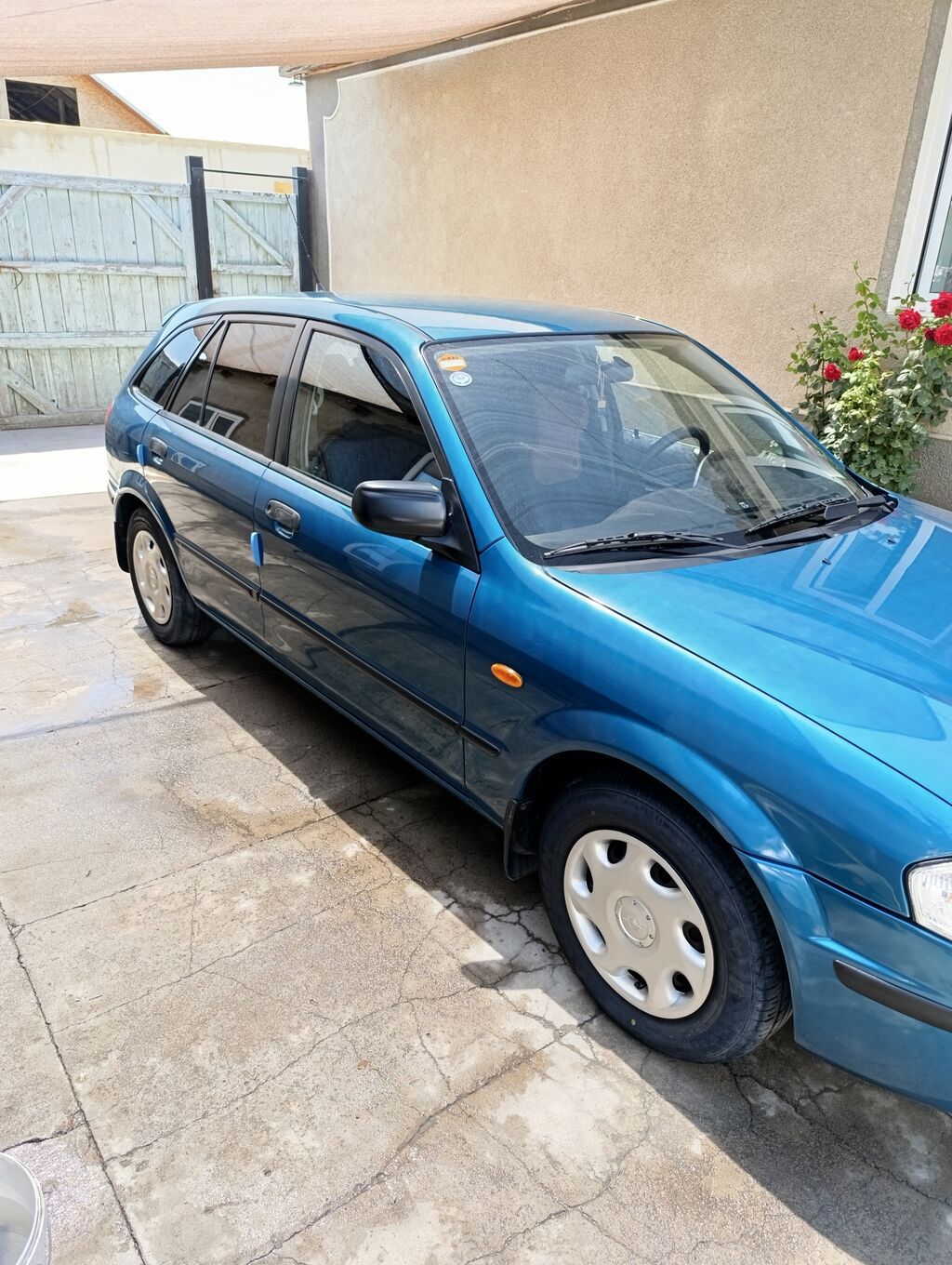 Mazda 323: 1999 г., 1.5 л, Автомат, Бензин, Универсал: фото 4