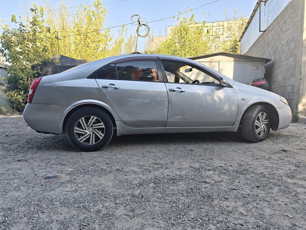 Nissan Primera: 2004 г., 2 л, Автомат, Газ, Седан: фото 6