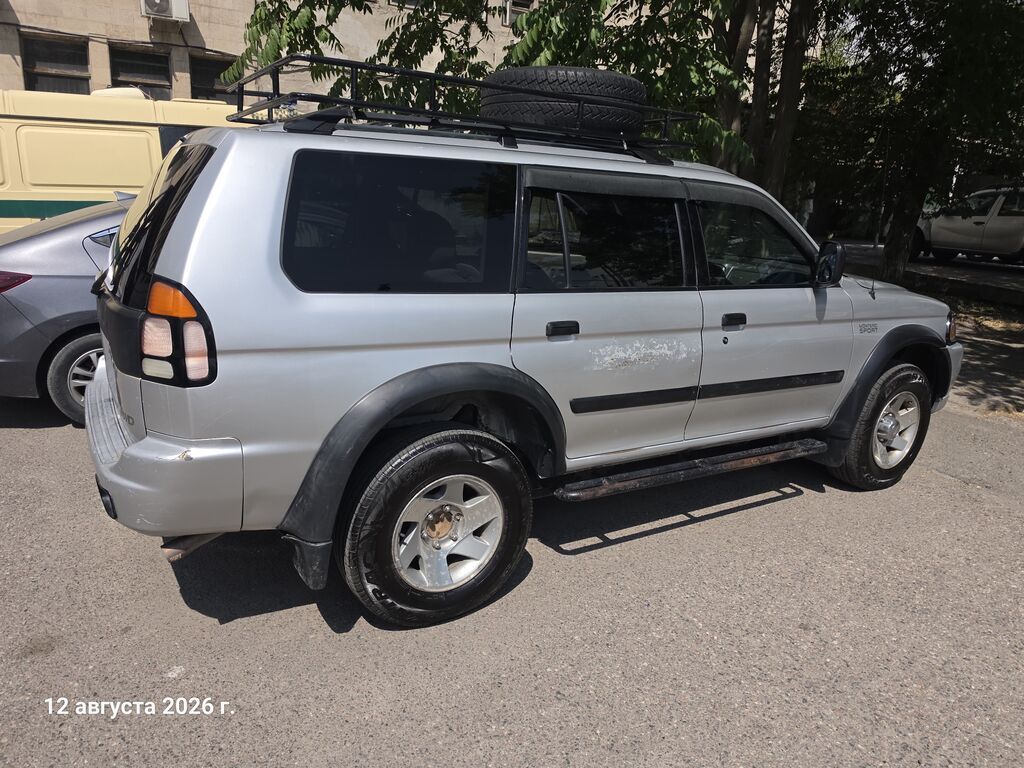 Mitsubishi Pajero Sport: 2003 г., 3 л, Автомат, Газ, Внедорожник: фото 4