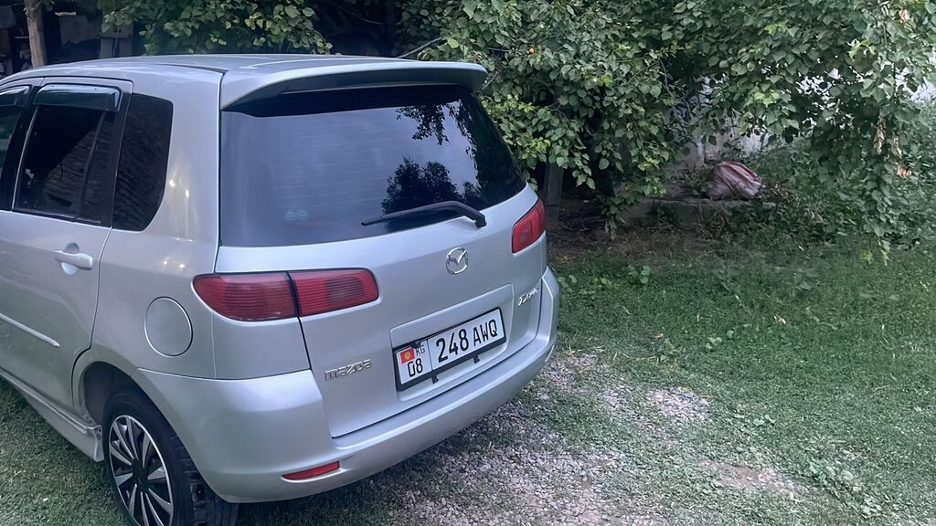 Mazda Demio: 2003 г., Автомат, Бензин, Хэтчбэк — фото 7