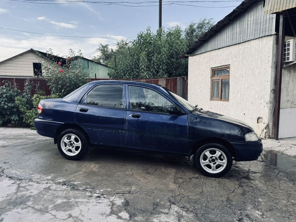 Kia Avella: 1998 г., 1.5 л, Механика, Бензин, Седан: фото 3