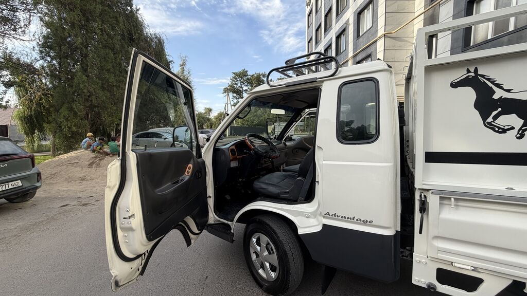 Hyundai Porter: 2003 г., 2.6 л, Механика, Универсал: фото 7