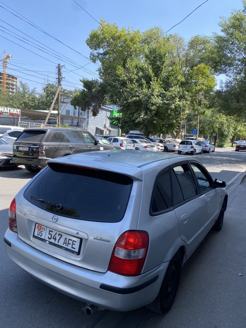 Mazda 323: 2002 г., Механика, Хэтчбэк: фото 5