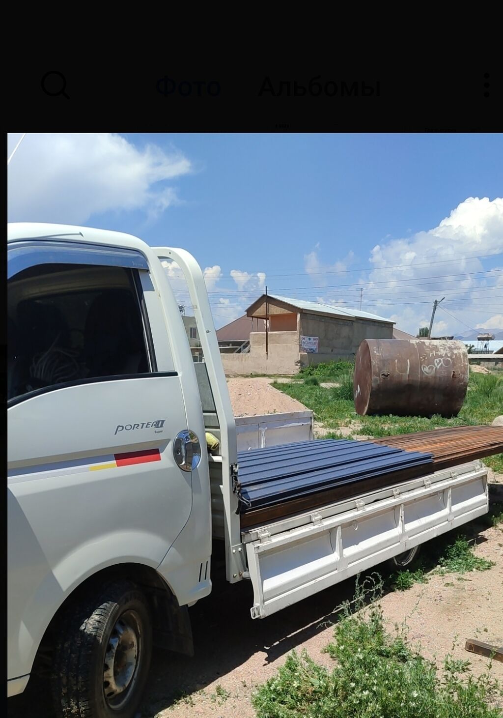 Hyundai Porter II, бортовой грузовик белого цвета. Компактный: фото 2